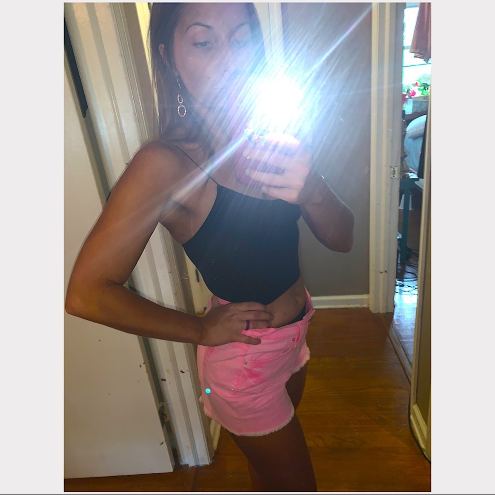 Neon pink denim shorts